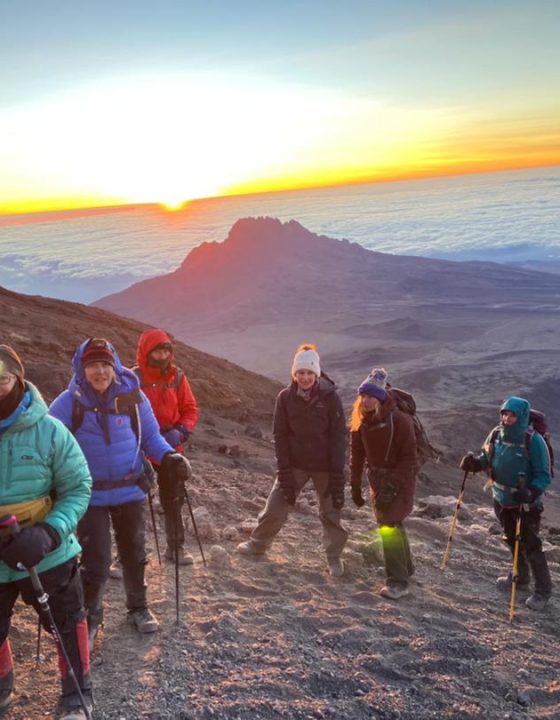 Group-of-Adventure-Women-at-sunrise-on-Kilimanjaro